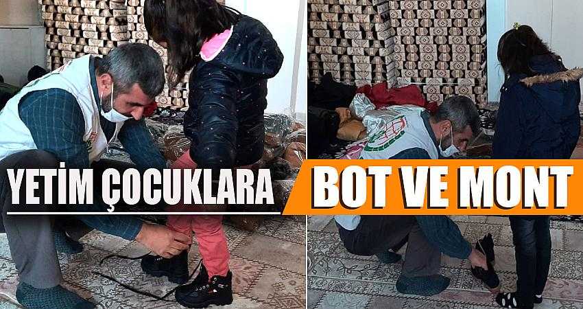 Yetim çocuklara bot ve mont yardımı